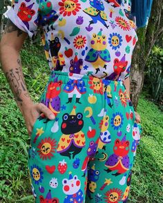 This group of frog wizards are perfect to keep you company everywhere you go 💖💖💖Made from a soft cotton blend, these joggers feature a vibrant print that won't fade.Wearing a size S, please see photos for reference and measurements. These are very fitted, so if you prefer a more loose fit or you're between sizes, I'd recommend sizing up!• 70% polyester, 27% cotton, 3% elastane• Fabric weight: 8.85 oz/yd² (300 g/m²)• Slim fit• Soft cotton-feel fabric face• Brushed fleece fabric inside• Cuffed Music Themed Outfits, Playful Cotton Joggers For Loungewear, Casual Cotton Pants With Cartoon Print, Fun Multicolor Cotton Pants, Casual Green Bottoms With Graphic Print, Playful Cotton Sweatpants With Elastic Waistband, Casual Cotton Bottoms With Cartoon Print, Cotton Loungewear Bottoms With Character Print, Fun Multicolor Cotton Bottoms