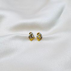 22k solid gold earrings with white cubic zirconia setting. This earring is approximately 6.8mm wide and 10.5mm in height and 1.92 grams in weight. This earring comes with screw back closure. Our 22k jewelleries are genuine real gold-not plated or filled.. Each item is packaged in our branded packaging, so your order is ready to be gifted.  All items are ready to be shipped within 2 working days through tracked post unless otherwise stated. For UK customers your order shall arrive within a week ( Gold American Diamond Earrings For Anniversary, Gold Brilliant Cut Cubic Zirconia Huggie Earrings, Studded Earrings, Solid Gold Earrings, Branded Packaging, Cz Stud Earrings, Real Gold, Solid Gold, Gold Earrings