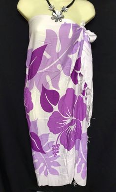 "This sarong/wrap is great for the summer time. This is a 100% rayon sarong, beautiful prints suited for your colorful personality . This versatile sarong can be worn in different ways. Sarong measures approximately 65\" x 44\" lightweight fringe rayon. Please note color, size, and design will vary due to the handmade nature of this item. Guaranteed fast shipping." Hawaiian Style Printed Sarong For Beach Party, Hawaiian Sarong For Beach Party, Hawaiian Printed Sarong For Poolside, Hawaiian Printed Sarong For Beach Party, Vacation Batik Print Sarong For Beach Season, Summer Vacation Sarong With Batik Print, Summer Beach Sarong With Batik Print, Traditional Printed Sarong For Summer, Beachwear Batik Print Sarong For Beach