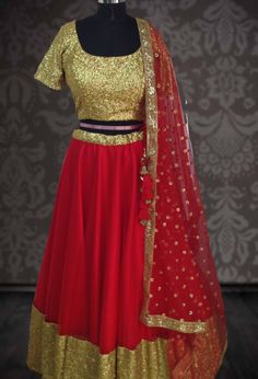 Lehenga: bright red lehenga Lehenga Fabric: net Blouse : gold sequin fabric Dupatta: sequin net Size: will be made to your measurements.  I'll send you a detailed measurements chart once you order Please convo me if you have any questions or need any customisation. Red Sequined Sets For Navratri, Red Sharara With Mirror Work For Party, Gold Sequined Sharara For Festivals, Reception Red Saree With Sequins, Red Sequined Saree For Reception, Reception Red Sequined Saree, Semi-stitched Red Saree With Sequins, Red Semi-stitched Saree With Sequins, Red Sequined Choli For Navratri