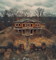 an old abandoned house in the middle of nowhere