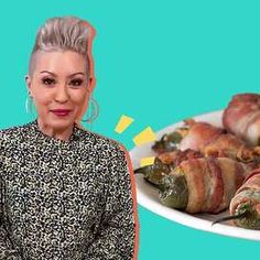 a woman standing in front of a plate of food