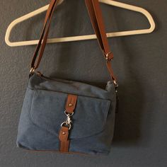 Kim Rogers Cross Body Bag Casual Denim Blue Shoulder Bag For On-the-go, Everyday Denim Blue Bag With Zipper Closure, Everyday Denim Blue Bag With Zipper, Denim Blue Bags With Zipper Closure For Everyday Use, Denim Blue Bags For Everyday Use, Everyday Denim Blue Crossbody Shoulder Bag, Everyday Denim Blue Satchel Shoulder Bag, Denim Blue Shoulder Bag With Zipper For Everyday Use, Denim Blue Crossbody Shoulder Bag For Everyday