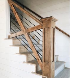 the stairs are made out of wood and metal