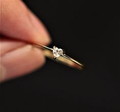 Solitaire Engagement Ring, Heart Shape Moissanite Ring, Minimalist Wedding Ring, Propose / Promise Ring, Dainty Ring, 14K Gold Ring-For Her Item Description: *Stone: Moissanite *Shape: heart 1. White Gold: 10K/14K/18K 2. Yellow Gold: 10K/14K/18K 3. Rose Gold: 10K/14K/18K 4. Silver: Sterling Silver 925 Size Customization: What Size you want... * You can also Customize ring size in US 4 to US 12! It sometimes affects to price. * Main Stone & Shape Customization: Main Stone: Cubic Zirconia, Moissan Minimalistic Promise Rings, Cute Promise Rings, Cute Engagement Rings, Silver Rings With Stones, Dainty Gold Rings, Silver Heart Ring, Ring Inspo, Zierlicher Ring, Promise Rings For Her