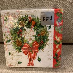 a box with a christmas wreath on it