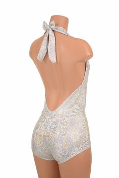 "This item is made to order, please read all the way through the listing before purchasing! This bodysuit is made of super sparkly silver on white shattered glass spandex! Deep V neckline and tie back halter top. Four way stretch for a figure forming fit. This bodysuit is unlined. Womens Sizing (See below for instructions on where measurements should be taken) XXS: Bust 29\"-30\" / Waist 22\"-23\" / Hips 30\"-32\" Extra Small: Bust 31\"-32\" / Waist 24\"-25\" / Hips 33\"-35\" Small: Bust 33\"-34 Fitted Backless Bodysuit For Party, White Fitted Bodysuit For Party, Party Bodysuit With Shimmer And Stretch, Shimmer Stretch Bodysuit For Party, Party Shimmer Stretch Bodysuit, Fitted Backless Leotard For Party, Fitted Backless Party Leotard, White Backless Bodysuit For Party, Metallic Shimmer Fitted Bodysuit