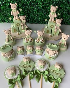 baby shower cake and cupcakes with teddy bears on them