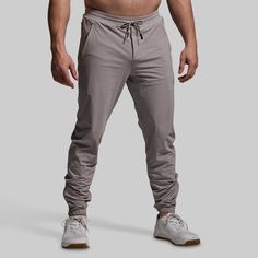 It doesn’t get more lightweight than this. Made from an ultra-breathable fabric, our Performance Jogger boasts distraction-free comfort that’s made for warm days in the gym, on the track, or around town. Added stretch provides maximum range of motion while a side-zipped leg opening allows for even greater mobility. With the ideal balance of comfort, function, and utility, these joggers will quickly become your go-to for summer training days. Cotton Joggers For Workout During Sports Season, Athleisure Joggers With Moisture-wicking, Functional Moisture-wicking Midweight Joggers, Functional Midweight Moisture-wicking Joggers, Casual Moisture-wicking Technical Fabric Bottoms, Urban Activewear For Sports, Moisture-wicking, Casual Moisture-wicking Bottoms In Technical Fabric, Urban Stretch Activewear For Sports, Moisture-wicking Casual Bottoms In Technical Fabric