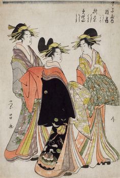 three geisha women in traditional japanese clothing