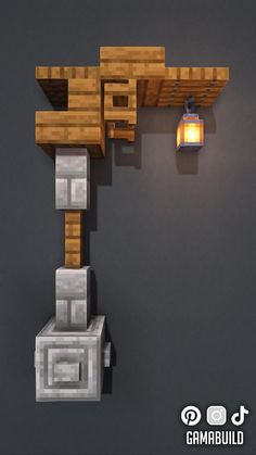 a lamp that is on the side of a wall next to some rocks and bricks