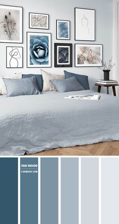 a bedroom with blue and gray colors in it