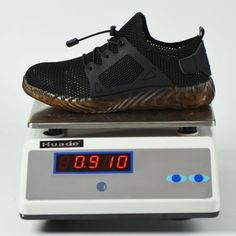 Wear-resistant Training Sneakers With Round Toe, Functional Slip-resistant Closed Toe Sneakers, Black Round Toe Running Shoes For Outdoor Work, Shock Resistant Low-top Sneakers For Safety, Black Wear-resistant Walking Shoes, Black Safety Low-top Sneakers, Black Low-top Safety Sneakers, Functional Low-top Safety Sneakers, Black Low-top Sneakers With Safety Features