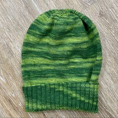 Never Used Hand Knitted Beanie. Beautiful Stitching. Ribbed. No Flaws. Casual Green Knit Knitting Pattern, Green Casual Knitting Pattern, Casual Green Knitting Pattern, Casual Knit Beanie Pattern, Casual Beanie Knitting Pattern, Casual Knit Beanie Knitting Pattern, Casual Knitting Pattern For Beanie, Casual Fitted Hand Knitted Pattern, Knit Beanie