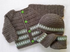 a crochet baby sweater and hat with matching mittens