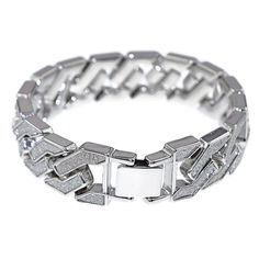 Dazzling men's Cuban hip hop bracelet. Silver tone over nickel-free alloy metal. Stunning squared chain links design. Bracelet length is 8.5" inches long. Thick bracelet measures 18 mm wide. Chunky bracelet weighs 75 grams. Individually adhered sand blast links. Sand blast looks like crushed stones. Bracelet bling links shine very bright. Features a stylish fold-over box clasp. This piece looks like a million bucks. Matching sand blast chain is available. 100% FREE SHIPPING in the USA. Customer Trendy Silver Cuban Link Bracelet With Curb Chain, Trendy Silver Cuban Link Bracelet, Trendy Silver Chain Bracelet For Streetwear, Trendy Silver Rectangular Bracelets, Trendy Silver Rectangular Bracelet, Trendy Silver Bracelet For Streetwear, Adjustable Cuban Link Bracelet With Box Chain, Adjustable Solid Cuban Link Bracelet, Trendy Silver Bracelets For Streetwear