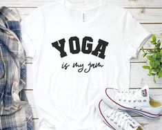 *please note: apparel brand may differ from picture*Yoga lover shirt The adult t-shirt is a unisex shirt hence it will have a looser fit. The order needs to be made individually Select the size , add to cart and then return to this page and order another one again please check the size chart in the photos section and choose the one that fit best. In case of doubt, choose a size up Please note that it will take 3-7 business days for me to process the order and another 3 to 5 business days to deli Sporty Yoga T-shirt With Letter Print, White Tri-blend Sporty T-shirt, Comfortable Gym T-shirt With Letter Print, Relaxed Fit Yoga T-shirt With Letter Print, White Workout T-shirt With Slogan, Comfortable Athleisure T-shirt With Letter Print, Comfortable Athleisure Letter Print T-shirt, Athleisure T-shirt With Letter Print And Comfortable Fit, Comfortable Pre-shrunk Workout T-shirt