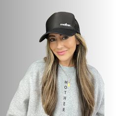 Simple and chic. This hat is for those who prefer a quieter, more minimalist style everyday hat. "mother" is embroidered in small white print on the left side of our premium trucker hat in Black. Feel strong and empowered while wearing this hat. Features: High profile, structured Color: Black "mother." embroidered in white Slightly curved visor "Strong as a mother" tag inside hat Foam trucker with nylon mesh back Plastic snapback We donate 10% of our proceeds to charitable organizations supporti Everyday Trucker Hat With Curved Bill, Everyday Trucker Snapback Hat, Trendy Black Trucker Hat For Everyday, Black Trucker Hat One Size Fits Most For Everyday, Black Trucker Hat With Curved Visor For Everyday, Black Everyday Trucker Hat One Size, Black Snapback Trucker Hat For Everyday, Everyday Black Snapback Trucker Hat, Everyday Trucker Hat