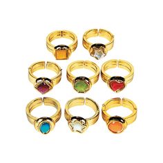 six rings with different colored stones on them