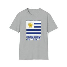 Introducing our Uruguay Retro T-Shirt, a contemporary take on casual comfort that seamlessly blends style with an international vibe. Featuring a retro style print design inspired by the national flag and crafted from exceptionally soft materials, this softstyle unisex tee is a wardrobe essential that combines a luxurious feel with unmatched durability. It's a great gift for world travel lovers and the perfect way to show off the place you love. Made with care, our shirts are 100% cotton for solid colors, while Heather colors and Sport Grey incorporate a touch of polyester for added versatility. The twill tape on the shoulders enhances durability, and with no side seams, this shirt ensures a smooth and comfortable fit. The ribbed knitting on the collar prevents curling damage, ensuring a p Retro T Shirt, Natural Gold, World Travel, Travel Lover, National Flag, Retro Tshirt, Polished Look, Twill Tape, The National