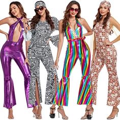 four women in colorful jumpsuits standing next to each other with their hands on their hips