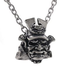 PRICES MAY VARY. 【Design】:The Japanese samurai represents strong will,courage, and is also a kind of amulet representing protection, exorcism, and justice.Ideal for friends or relatives that love samurai's or Japanese culture and history.Pure Handmade. 【Material】: copper，This necklace is made by Wchama and Reod&Dvos. 【Product Size】:Chain length: 58cm(22.8 inch) / Pendant length and width: 23mm×20mm(0.9 ×0.78 inch) / Weight: about 22g. 【Unisex Gift】: samurai armor helmet necklace with an auspicio Samurai Necklace, Ghost Tsushima, Samurai Shogun, Armor Helmet, Mask Necklace, Samurai Armor, Japanese Samurai, Luck Charm, Unisex Gift