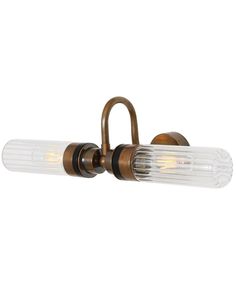 an antique brass finish wall light with two clear glass shades on the arms and sides