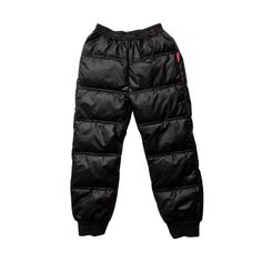 a pair of black pants on a white background Winter Techwear Parachute Pants For Sports, Winter Nylon Pants For Streetwear, Winter Techwear Nylon Cargo Pants, Functional Winter Streetwear Pants, Winter Outdoor Techwear Bottoms, Winter Techwear Bottoms For Outdoor, Black Full-length Parachute Pants For Outdoor Activities, Black Waterproof Winter Pants, Black Full Length Parachute Pants For Outdoor Activities