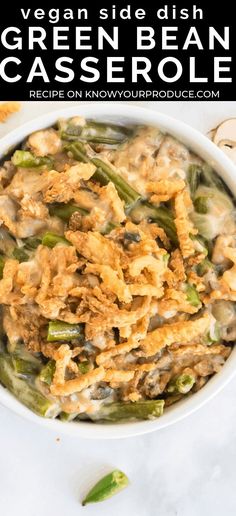 green bean casserole in a white bowl on a marble countertop with text overlay