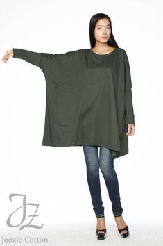 "🚚..ALL ORDERS ARE SHIPPED VIA DHL EXPRESS MAIL Simple and modern, with an air of urban playfulness, this top has boxy, wide cuffed hem sleeves and a scoop neckline; the extra wide body gives you all the comfort without losing an ounce of style! DETAILS: * Pull-on style * Scoop neck * Wide cuffed hem sleeves * Longer at the side hems * Loose silhouette MEASUREMENTS: Sleeve length: 25\" (63.5 cm) Sleeve cuff: 10\" (25.5 cm) round Bust: 78\" (354 cm) Hips: 84\" (213 cm) Tunic length from shoulder Fashion Over 50 Fifty Not Frumpy, Fitted Tunic Tops, Fitted Tunic, Scoop Neck Long Sleeve, Wide Body, Refashion Clothes, Tunic Length, Long Sleeve Tunic, Womens Tunics