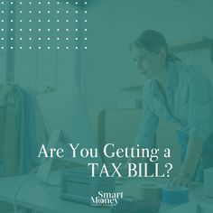 a woman is working on her computer in an office with the words are you getting a tax bill?