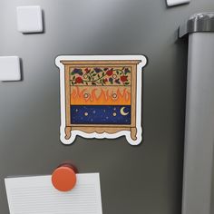 a refrigerator with magnets on it and a sticker