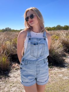 Unleash your inner wild child with our Wilder Denim Shortalls. A must-have for any closet, these shortalls add a playful touch to any outfit. Perfect for a day out with your squad or a casual date, a versatile and trendy addition to your wardrobe! light denim short overalls rolled up hem front pocket detailing with side button closures adjustable shoulder straps soft & stretchy denim material! Brand: Hidden SIZING: Runs true to size! Want a looser fit? Size up! Mary Kate is wearing a size medium Denim Short Overalls Outfit, Short Overalls Outfit, Denim Short Overalls, Wardrobe Light, Denim Shortalls, Overalls Outfit, Short Overalls, Mary Kate, Casual Date