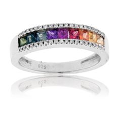 Sterling Silver with .89ctw Sapphires and .09ctw Diamond Ring A wide range of colorful sapphire gemstones are boldly displayed in this channel set sterling silver band. Princess cut sapphires in rich rainbow hues radiate amid the shimmering and illuminating brilliance of the demi-pave set diamonds which line the outer edges of this stunning band. Sapphire is a precious gemstone, a variety of the mineral corundum, an aluminum oxide. Sapphire is generally blue, but natural fancy sapphires also occ Rainbow Ring, Lesbian Wedding Rings, Fancy Sapphire, Rainbow Sapphires, Rainbow Rings, Sapphire Band, Orange Sapphire, Sapphire Diamond Ring, Sapphire Jewelry