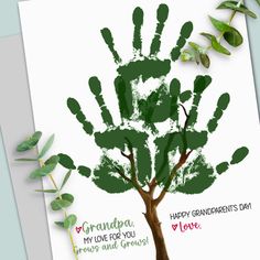 a handprint tree is shown on top of a card