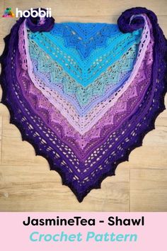 a crocheted triangle shawl with the words jasminetea shawl written below it