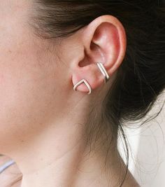 This is a set of 2 conch ear cuff earrings made of silver 925. No piercing needed. You can wear them everyday. The earrings are totally handmade, hypoallergic, and free of chemicals, varnishes, and nickel. The price is for 2 ear cuffs.See my whole jewelry collection here--> https://www.etsy.com/shop/SosyGalleryFollow Sosy Gallery onInstagram @sosy_galleryTwitter--> https://twitter.com/sosygalleryFacebook--> https://www.facebook.com/sosygalleryhttps://gr.pinterest.com/sosygallery/ Nickel Free Sterling Silver Ear Cuff, Modern Sterling Silver Huggie Ear Cuff, Trendy Pierced Sterling Silver Ear Cuff, Silver Huggie Ear Cuff For Everyday Wear, Sterling Silver Ear Cuff For Everyday Wear, Everyday Silver Huggie Ear Cuff, Everyday Sterling Silver Huggie Ear Cuff, Sterling Silver Huggie Ear Cuff For Pierced Ears, Minimalist Sterling Silver Ear Cuff With Ear Wire