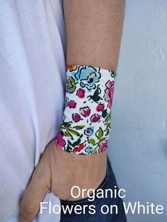 Wide fabric floral wrist cuff - CHOOSE YOUR PATTERN from the drop down menu. Visit my shop for more colors. https://www.etsy.com/shop/VinciBazaar Handbands, wrist cuffs, wrist wraps - visit my shop for more color matching accessories When ordering the Set of 2, 3 or 4 - Please specify in the "Notes" when purchasing, which color combination you would like. *Handmade with love and care in a smoke free home *Every wrist cuff is sewn by me *Double layered *Ideal for covering wrist tattoos *Stretchy Adjustable White Cuff Bracelet, Adjustable White Wristlet With Wrist Strap, Wrist Tattoo Cover Up, Wrist Wraps, Tattoo Cover Up, Tattoo Cover, Tattoo Cover-up, Wrist Tattoo, Wrist Wrap