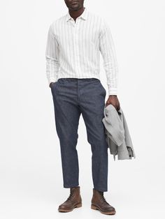 A sleek officer's pant in our relaxed, Trooper fit, beautifully crafted in a soft, stretch-cotton chambray from an Italian mill.  Button fly.  Belt loops.  On-seam pockets.  Rear buttoned flap pockets.  Unlined.  Produced in a facility that runs P. A Casual Button-up Jeans For Work, Button-up Cotton Jeans For Everyday, Cotton Button-up Jeans For Everyday, Business Casual Chino Cotton Twill Jeans With Welt Pockets, Classic Button-up Relaxed Fit Jeans, Classic Pants With Button Cuffs For Spring, Casual Fitted Button-up Pants, Relaxed Fit Denim Pants With Button Closure, Classic Spring Pants With Button Cuffs