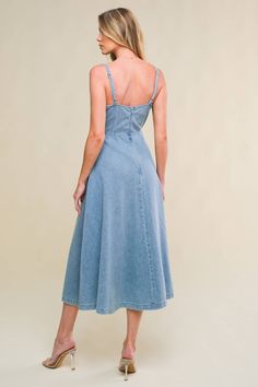 A washed denim midi dress featuring straight neckline with front tie, straps, waist yoke, full skirt and back zipper closure Details: Self : 83% Cotton 17% Viscose Size & Fit - Model is 5`8" And Wearing Size Small- Measurements Taken From Size Small- Approx. Length: 49" Denim Blue Midi Dress In Denim, Casual Midi Denim Dress With Pockets, Denim Dress With Spaghetti Straps For Day Out, Spring Dresses With Spaghetti Straps And Medium Wash, Mid-length Denim Dress For Summer, Washed Blue Midi Denim Dress For Day Out, Spring Denim Midi Dress, Medium Wash Cotton Midi Dress, Medium Wash Midi Dress With Pockets