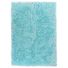 a blue shaggy rug on a white background