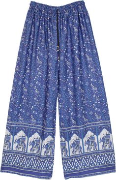 A bohemian streetwear summer pants in cobalt blue and white with a wide leg bottom - these elastic waist pants are lightweight and comfortable.  These loose-fit pants are ideal for lounge wear or yoga wear and just perfect for the beach too. #tlb #Floral #Printed #Elephant #Streetwearpajamas #WideLegPants #BeachPants #Tribalbohopants Casual Blue Wide Leg Harem Pants, Blue Harem Pants For Spring Vacation, Blue Harem Pants For Beach In Spring, Ankle-length Blue Harem Pants For Vacation, Blue Bohemian Bottoms With Boho Print, Bohemian Blue Bottoms With Boho Print, Bohemian Blue Bottoms For Summer, Summer Bohemian Blue Bottoms, Blue Ankle-length Wide Leg Pants For Summer