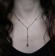 Artemis Dreaming. Βeauty and magic in the most delicately dark way. This necklace is composed of black rhodium over 925 sterling silver delicate sparkling chain, four burgundy garnet gemstones and a tiny burgundy agate drop. You can choose between these chain lengths: 15 / 16 / 17 / 18 inches Not sure which length to buy? We can add a 1 inch extender chain. Just write a note at checkout! ❈ We send all our items with registered mail. ❉ Due to the organic nature of stones, there might be a slight variation in colour, size and shape. ✺ All items come packaged in a quality velvet pouch ready for gift giving. ✽ If you want to make a special order, just contact us! Dainty Gothic Jewelry, Gothic Pendant Necklace For Party, Gothic Dangle Necklaces For Parties, Gothic Necklaces With Adjustable Chain, Gothic Dangle Necklaces For Jewelry Making, Gothic Dangle Necklaces As Gifts, Gothic Sterling Silver Necklaces For Parties, Gothic Dangle Necklaces For Gifts, Gothic Dangle Necklace For Gift