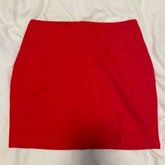 Fashion Nova Red Mini Skirt Size Small Never Worn. Red Stretch Mini Skort, Red Stretch Skort Mini Length, Red Stretch Mini Length Skort, Red Casual Mini Skort, Trendy Fitted Red Mini Skirt, Casual Red Mini Skort, Red Casual Mini Length Skort, Red Fitted Trendy Skirt, Trendy Red Fitted Skirt