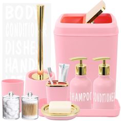 pink bathroom accessories including soap, toothbrush and lotion in front of white background