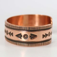 Copper Cuff Bracelet with Hand-Stamped Designs. .75” Cuff Width6.75” Inside Measurement, plus 1.125” opening(7.875" Total Circumference - XX-Large) Copper Cuff Bracelet, Copper Cuff, Cuff Bracelet, Hand Stamped, Copper, Cuff, Stamp, Bracelet