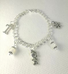 Birthday Gift for Girls - My First Charm Bracelet - Daughter Charm Bracelet - Jewelry for Children - Personalized Charm Bracelet - SCC1253This listing is for one 6 inch Silver Plated Charm Bracelet. For a larger or smaller sized chain, please include your desired size in a message to us upon checkout.Bracelet comes as pictured, including all charms (letter initial charm, little girl charm, 2 white bead charms, flower charm). For additional charms, please look through our selection here: https:// White Charm Bracelet For Birthday, White Charms Bracelets For Birthday Gift, Cute Nickel-free Charm Bracelet For Birthday, Cute Silver Charm Bracelet For Birthday, Cute Nickel-free Bracelets For Birthday, Cute Silver Bracelet For Birthday Gift, Cute Silver Bracelet For Birthday, Cute Silver Bracelets For Birthday, Nickel-free White Charm Bracelet As Gift