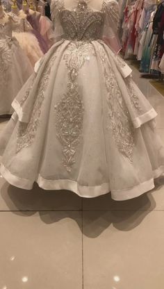 Indulge in the luxurious elegance of the Dreamy Vow Arabic White Quinceanera dress. Adorned with delicate beading and pearls, this Dubai-inspired gown will make your little princess feel like royalty on her special day. Perfect for birthday celebrations and wedding parties, this dress is sure to impress.