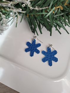 These cute blue snowflake faux leather earrings are fashionable, lightweight, nickel-free and post-style.  Get the cute look of dangle earrings without the irritation.  So comfortable, you'll forget you are wearing them.  They are the perfect pair of earrings to compliment any holiday outfit - whether you are making a subtle or bold statement. Petite Earrings, Holiday Earrings, Snowflake Earrings, Faux Leather Earrings, Blue Snowflakes, Holiday Earring, Holiday Outfit, Free Post, Nov 6