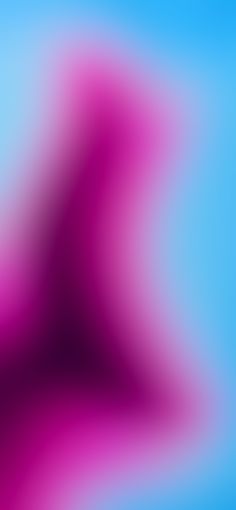 an abstract blurry background with pink and blue colors in the middle, on a light blue background